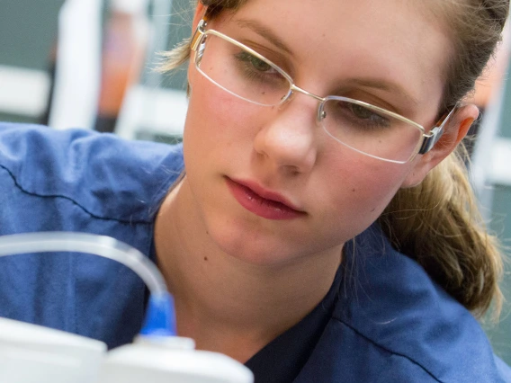 nursing student focused on a task