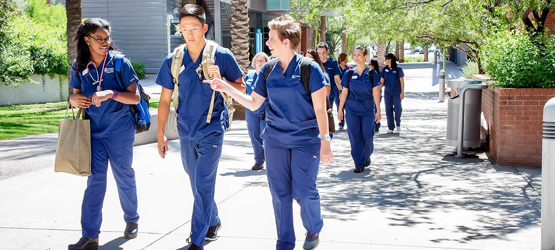 College of Nursing students walking and talking