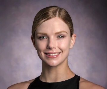 Head and shoulders photo of Chloé Littzen-Brown, Alumni Council President