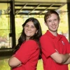 Lauren Taylor and Matthew Racine standing back to back.