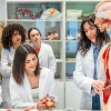 Female nursing instructor with a human organ manikin teaching five student nurses.