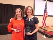 Amanda Gluski and Dr. Judith Gordon holding their awards.